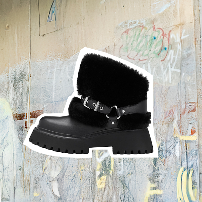 White and brown faux-fur winter boot with platform sole and lace-up details