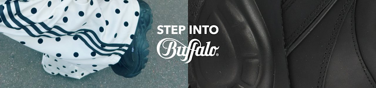 Close-up of black Buffalo footwear with a polka-dot outfit and Buffalo branding campaign banner.