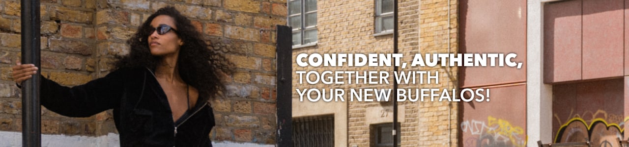 Person in an urban setting with “Confident, Authentic, Together With Your New Buffalos!” campaign text