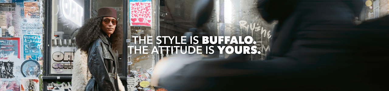 Model wearing BUFFALO FW26 fashion in an urban street scene.