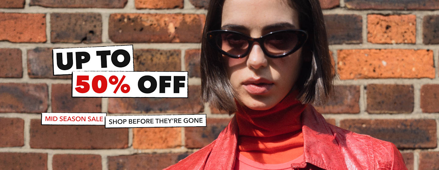Person wearing sunglasses and a red outfit with “Up to 50% Off” mid-season sale campaign text